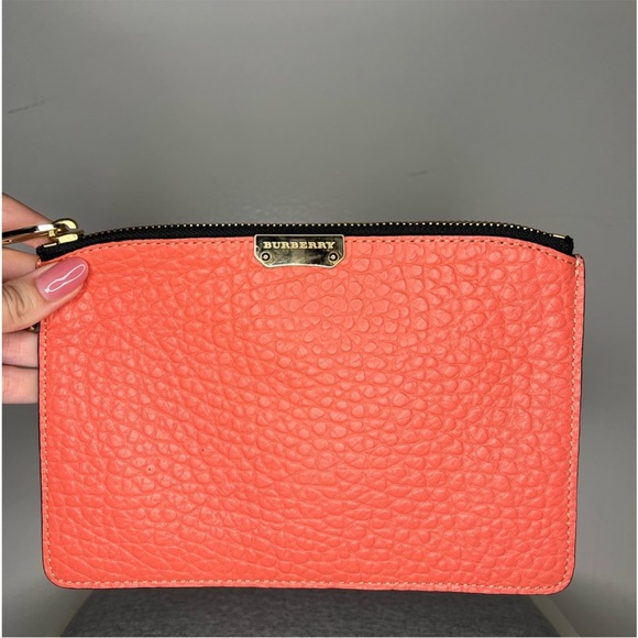 Burberry Accessories - BURBERRY
CONTINENTAL WRISTLET CORAL GRAINED LEATHER
NWOT